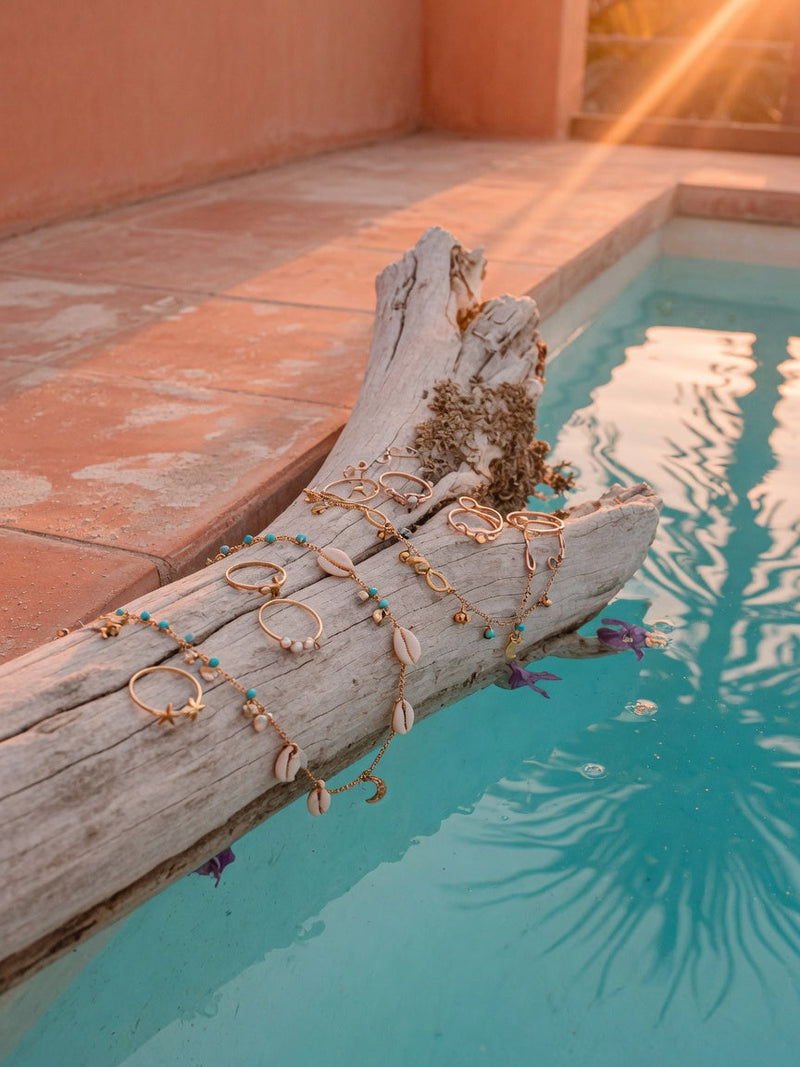 Nice Feet brand origin editorial, toe rings and anklets by the pool
